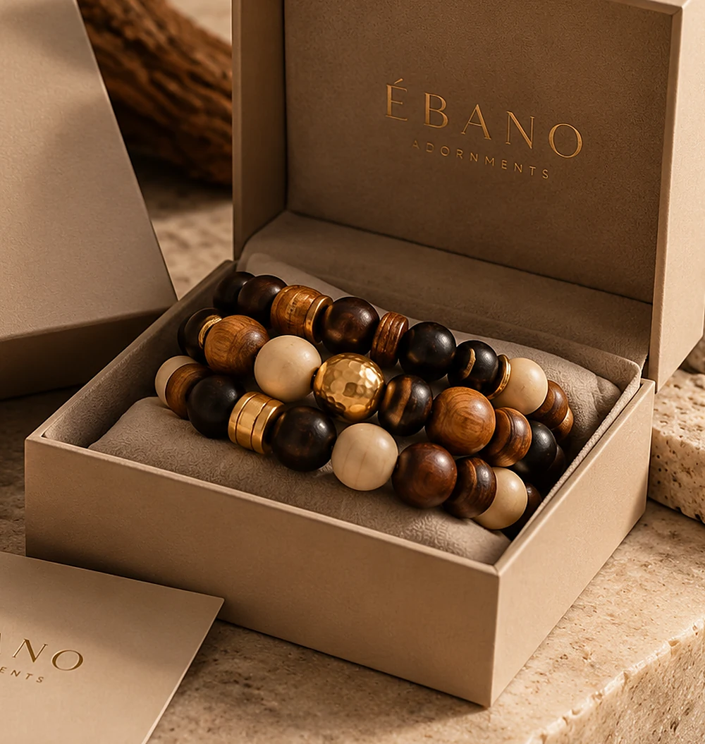 Wood and gold beaded bracelets presented in ÉBANO-inspired natural packaging